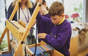 Weaving in the Craft Lab | Image Credit: Heather Birnie